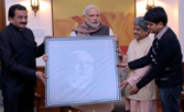 Unique portrait made through IKAT weaving presented to PM