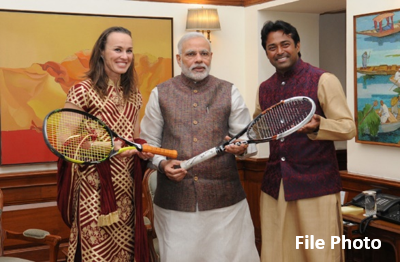 PM congratulates Leander Paes and Martina Hingis, on winning the mixed doubles title at US Open