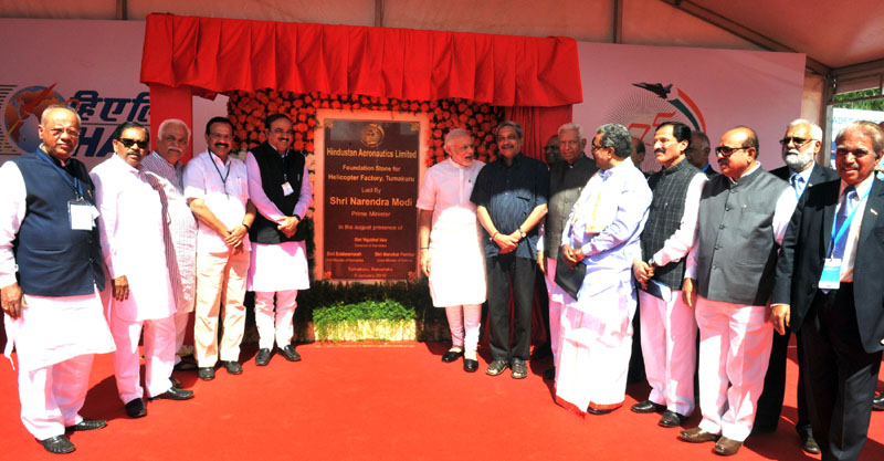 PM unveils plaque for foundation stone for new helicopter manufacturing unit of HAL in Tumkur district, Karnataka