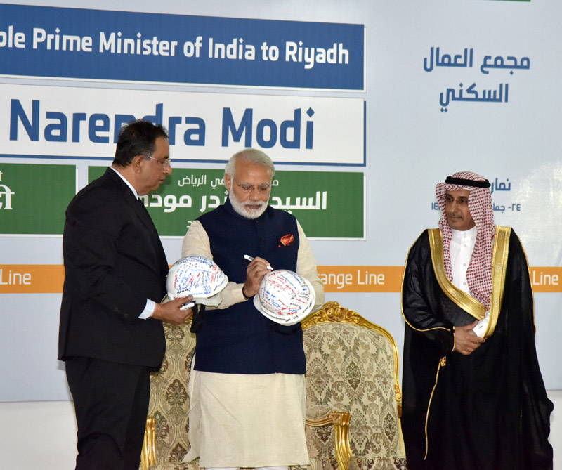The Prime Minister, Shri Narendra Modi signing the helmet, during his visit to the L&T residential complex, in Riyadh Saudi Arabia on April 02, 2016.