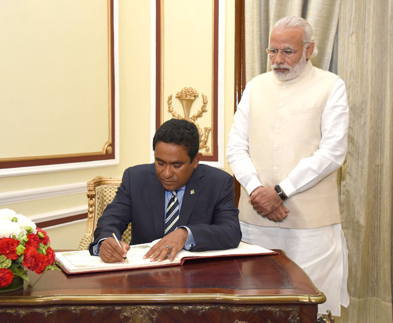 The President of the Republic of Maldives, Mr. Abdulla Yameen Abdul Gayoom signing the visitors book, during the exchange of agreements and joint media briefing, in New Delhi on April 11, 2016.