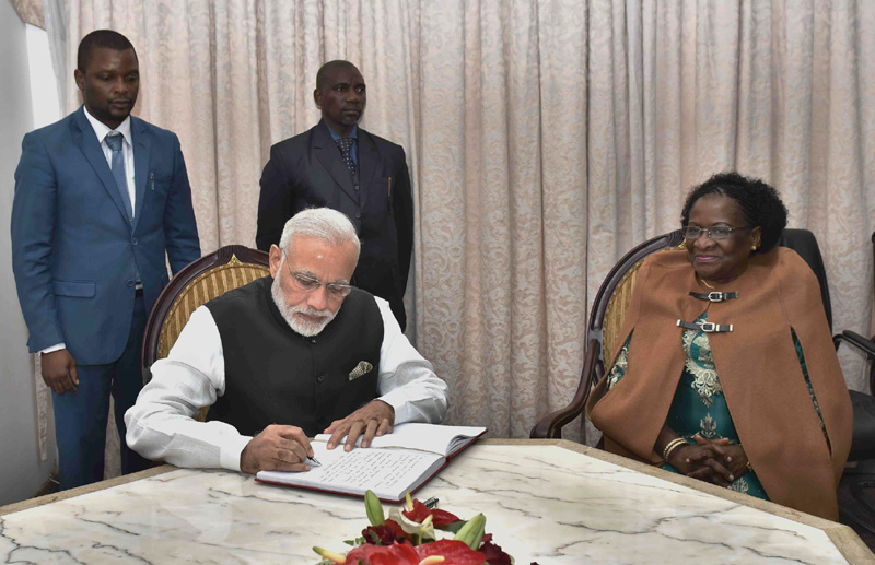 The Prime Minister, Shri Narendra Modi signing the visitor's book at the National Assembly, at Maputo, in Mozambique on July 07, 2016.