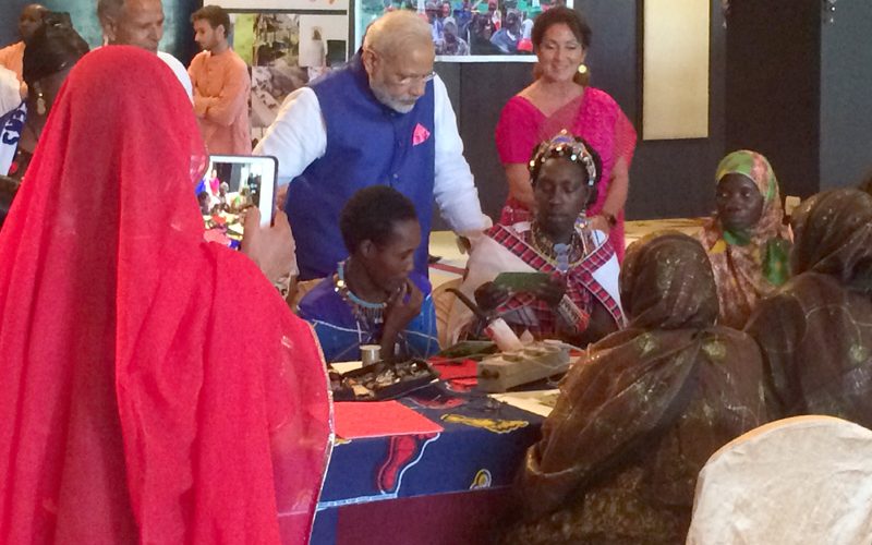 Rural women solar engineers (Solar Mamas) present a skill demonstration to PM in Dar-es-Salaam