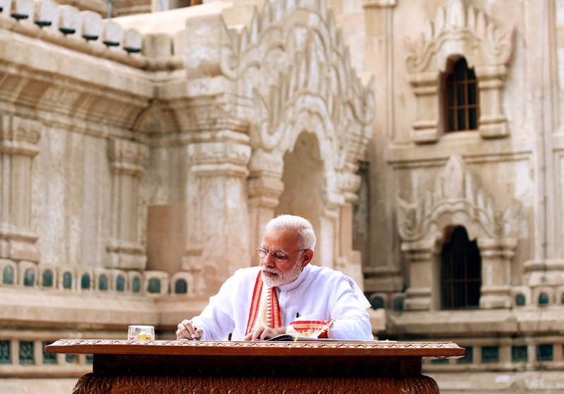The Prime Minister, Shri Narendra Modi signing the visitor's book at Ananda Temple, in Bagan, Myanmar on September 06, 2017.