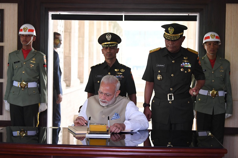 The Prime Minister, Shri Narendra Modi signing the visitor's book at the Kalibata National Heroes' Cemetery, in Jakarta, Indonesia on May 30, 2018.