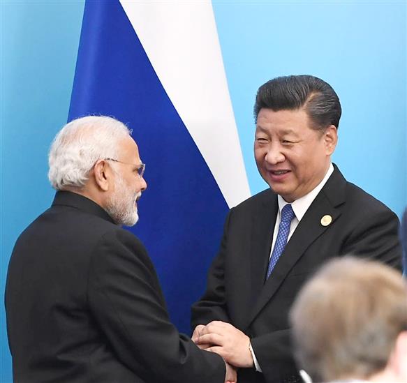 The Prime Minister, Shri Narendra Modi with the President of the People’s Republic of China, Mr. Xi Jinping, at the Signing Ceremony of the Shanghai Cooperation Organisation (SCO) Summit, in Qingdao, China on June 10, 2018.