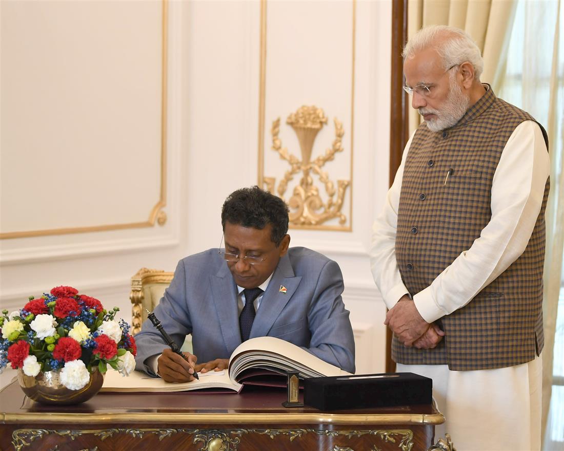 The President of the Republic of Seychelles, Mr. Danny Antoine Rollen Faure signing the visitors’ book, at Hyderabad House, in New Delhi on June 25, 2018.