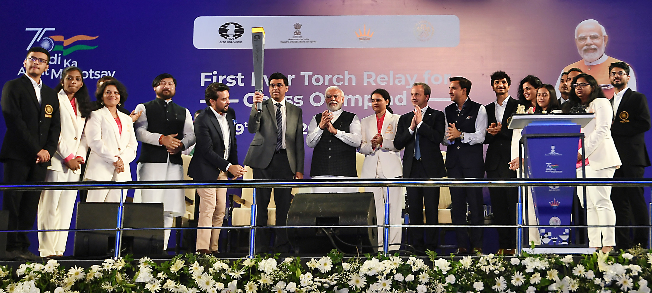 Yogi hands over Chess Olympiad torch to Viswanathan Anand