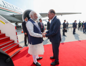 PM received by PM of Malaysia on arrival in Kuala Lumpur