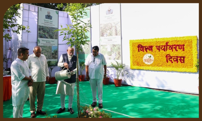 PM plants tree in Surat under the ‘Ek Ped Maa Ke Naam’ campaign on World Environment Day PM plants tree in Surat under the ‘Ek Ped Maa Ke Naam’ campaign on World Environment Day