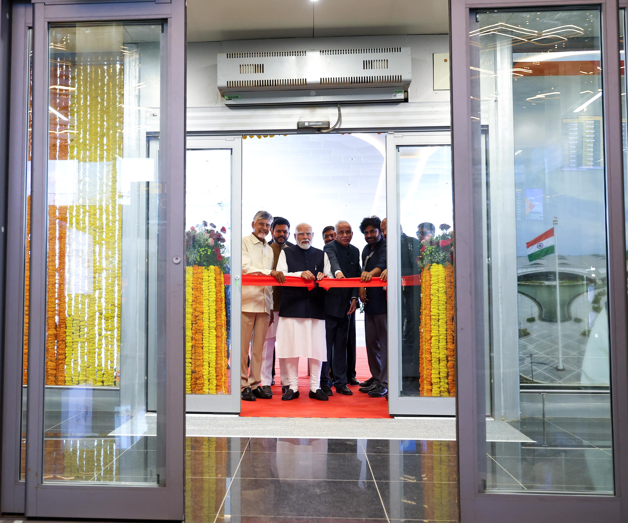 PM lays the foundation stone, inaugurates and dedicates to the nation multiple development projects worth over ₹17,900 crore in Bhogapuram in Vizianagaram, Andhra Pradesh